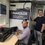 Two engineers in the Nakolos Lab training for Plugfest