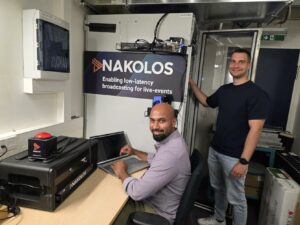 Two engineers in the Nakolos Lab training for Plugfest