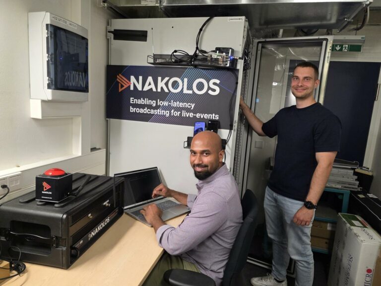 Two engineers in the Nakolos Lab training for Plugfest