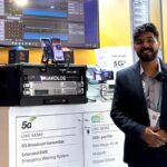 Product Manager presenting Alarming live demo at booth